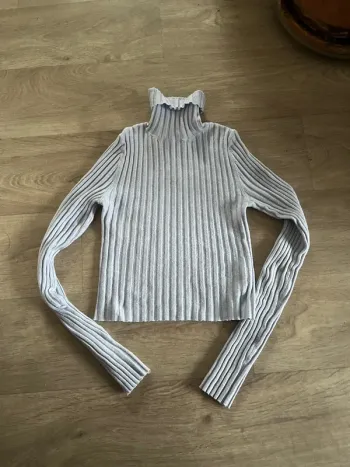Pull col roulé