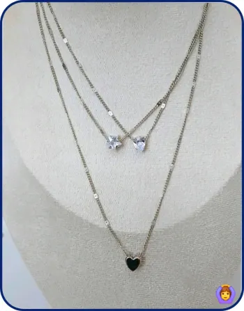 Collier Tendance multi-rangs argenté pendentifs cœurs – chic et féminin