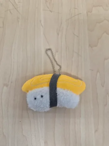 Mascotte Tsuburana hitomi no Osushi : Tamago