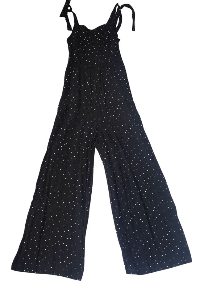 Combinaison noire à pois blanc taille XS