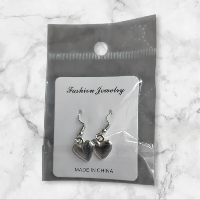 Boucle d’oreille argentée pendentif cœur neuve