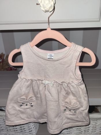 Robe rose pâle avec poches lapins