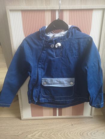 Manteau obaibi en très bon état 23 mois