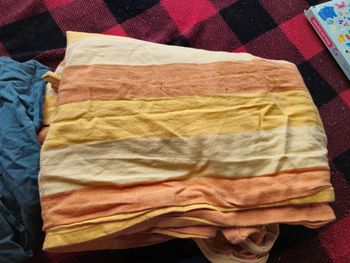 Echarpe de portage non tissée