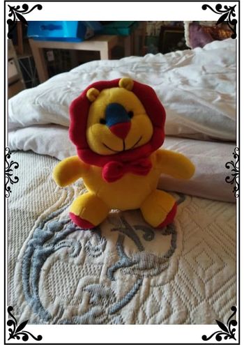 Mini peluche lion rouge et jaune