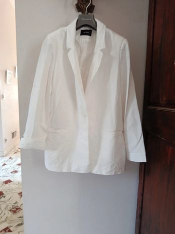 Très belle veste mi longue T 42