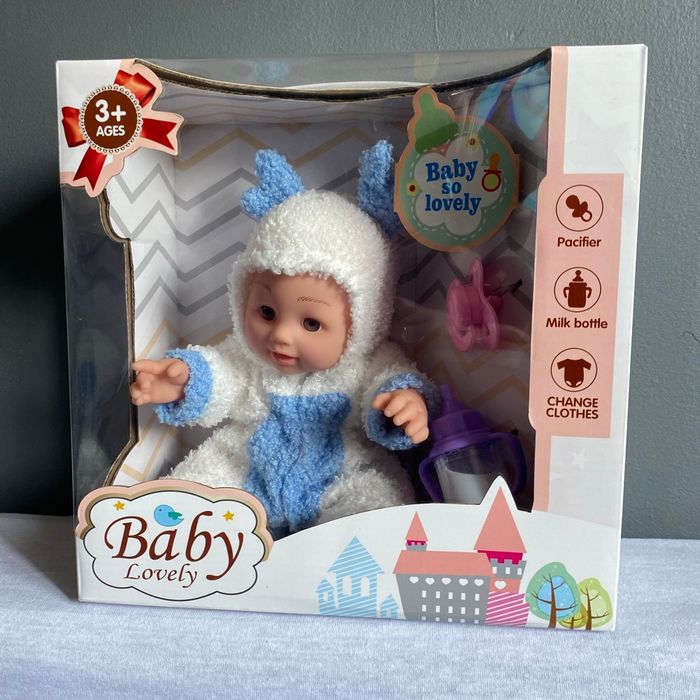 Poupon 25 cm avec accessoires 3 ans+