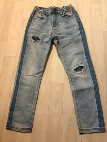 Jean tex 7/8 ans bleu clair effet destroy très bon état