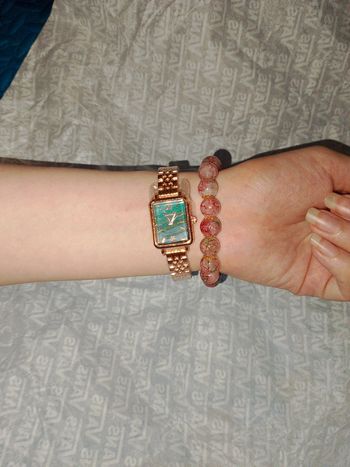 Tres belle montre rosegold  femme avec bracelet en perles de verre