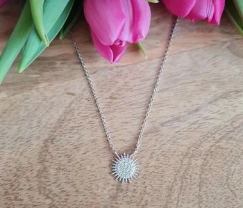 Collier pendentif soleil en argent rhodié et oxydes de zirconium neuf
