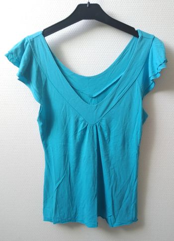 Haut bleu turquoise volant épaule 38 offert