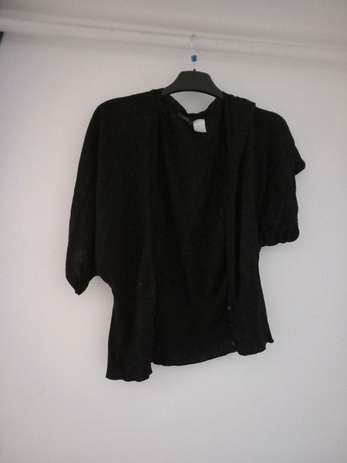 Gilet manches chauve-souris noir taille 38.40