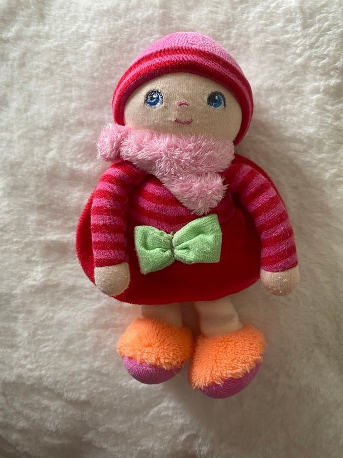 Doudou poupée corolle grenadine