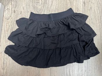 Jupe à volant noir gemo taille 10 ans