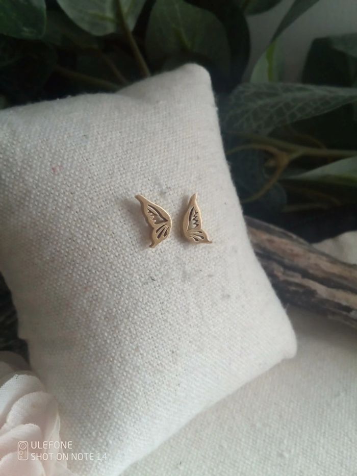 Boucles d'oreilles ailes de papillon en acier doré