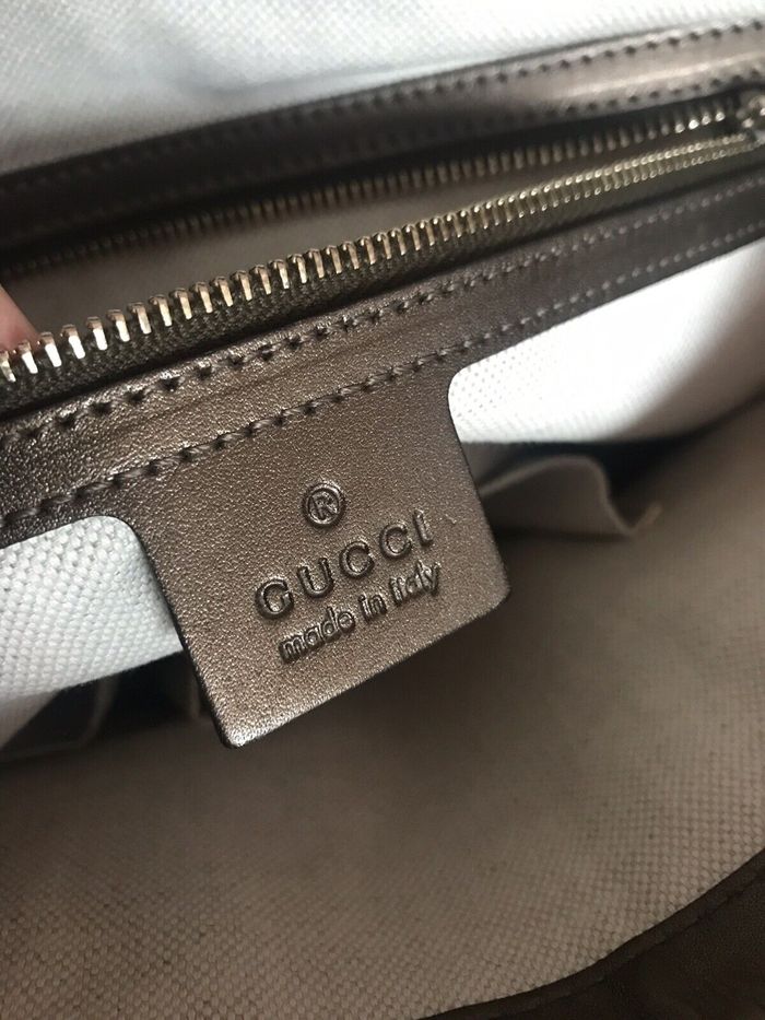 Sac cartable Gucci Guccissima en cuir marron gaufré, - photo numéro 6