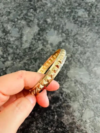 Magnifique bracelet doré relief neuf