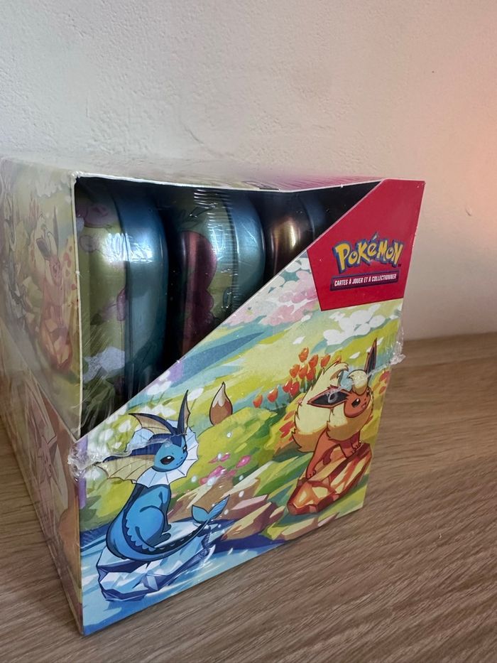 Display Pokémon mini tins Ev8.5 Évolutions Prismatiques scellée - photo numéro 2