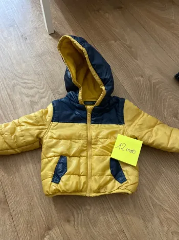 Doudoune taille 12 mois parfait état