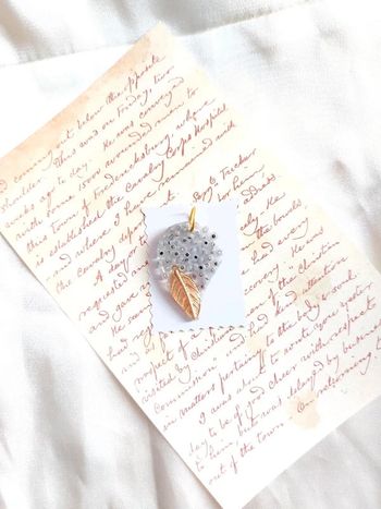 Pendentif en résine avec rocaille