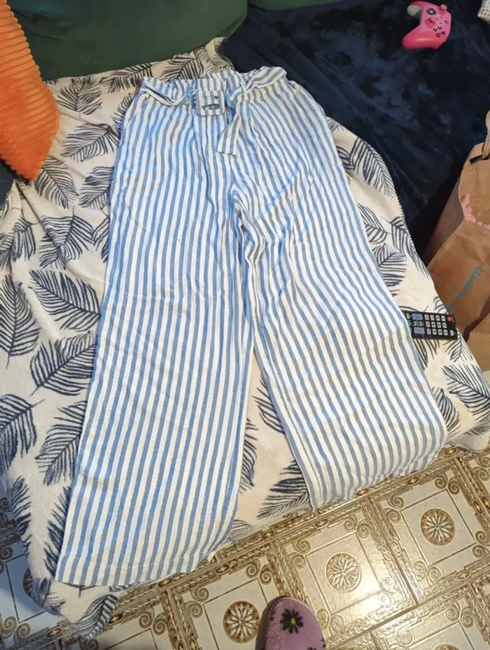 Pantalon rayé jambes évasées