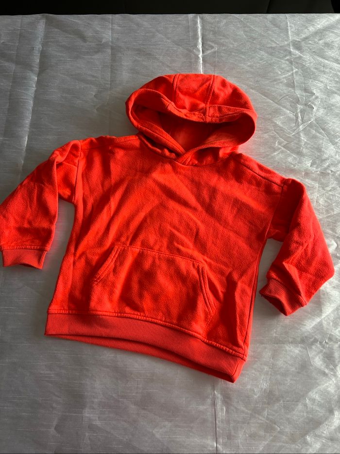 Sweat à capuche orange fluo