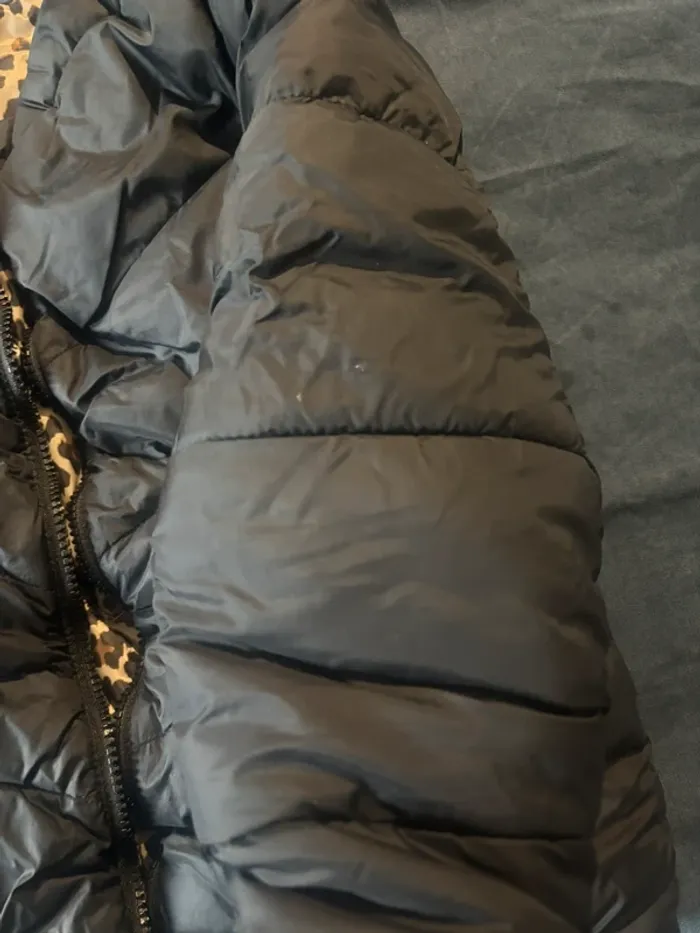 Veste torrente irréversible noir et léopard en très bon état - photo numéro 7
