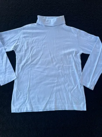Col roulé bleu clair