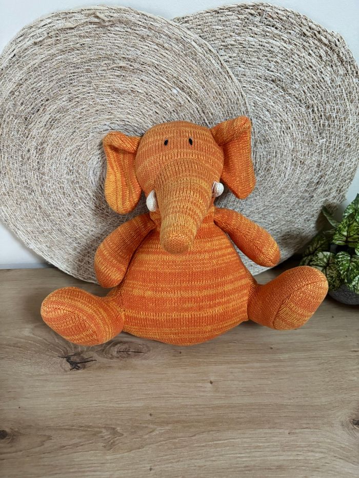 Doudou éléphant laine orange Sia 26 cm