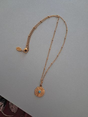 Collier pendentif perle bleue