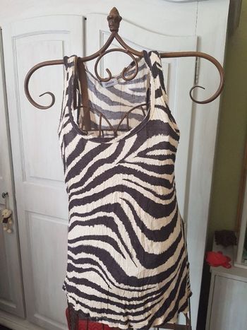 Débardeur léopard. Pimkie .taille L .longueur 60 cm