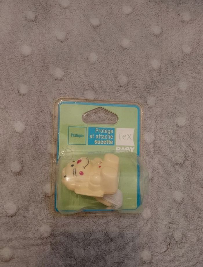 Protège et attache sucette