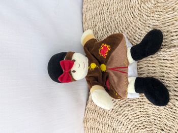 Doudou marionnette asiatique avec sa natte 