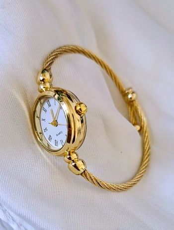 Montre bracelet vintage Quartz Doré