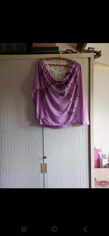 Blouse avec un voile en dessous