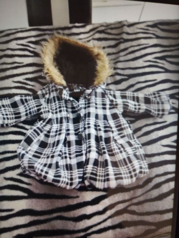 Manteau à carreaux