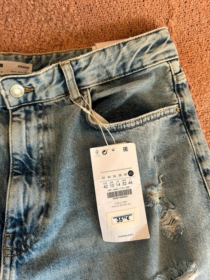 Jeans bleu clair effet déchiré • taille 42 - photo numéro 11