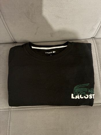 Pull Lacoste noir – intemporel & élégant