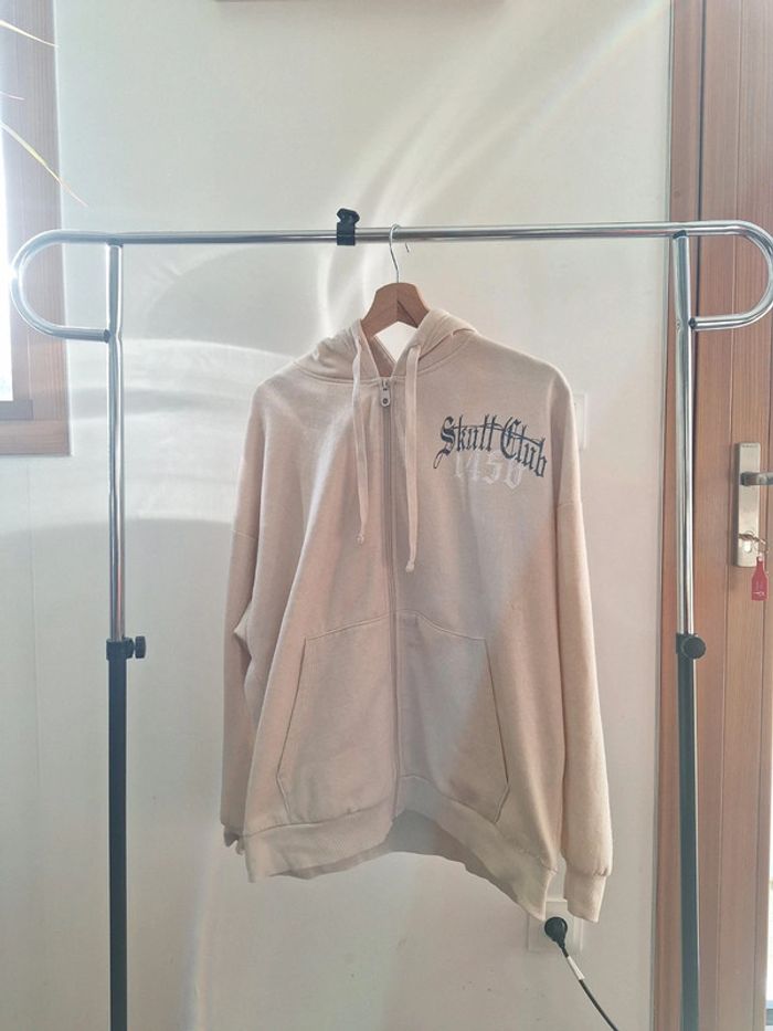 Veste oversize beige "Skull Club 1450" Femme S Jennyfer