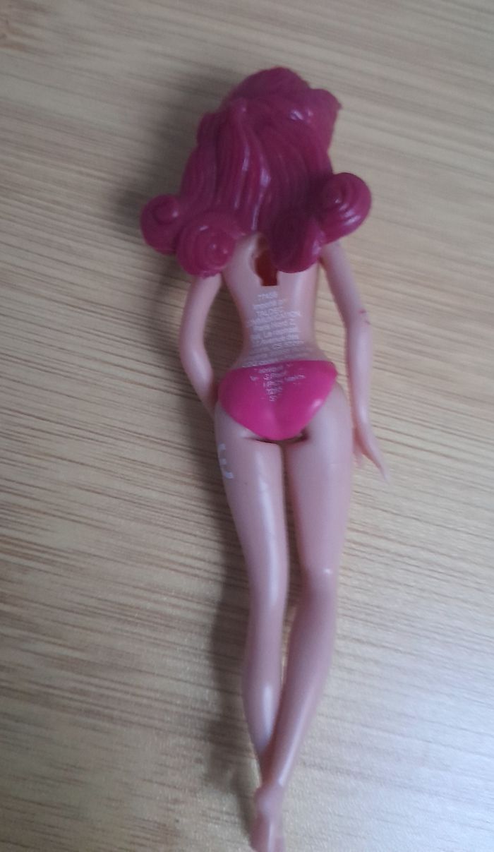 Petite poupée Rosetta  avec 4 robes - photo numéro 4