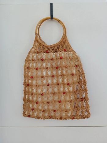 Sac vintage tressé en ficelle
Perles intégrées