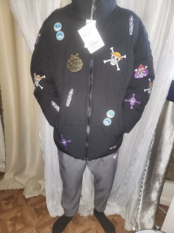 Doudoune one piece taille L Célio