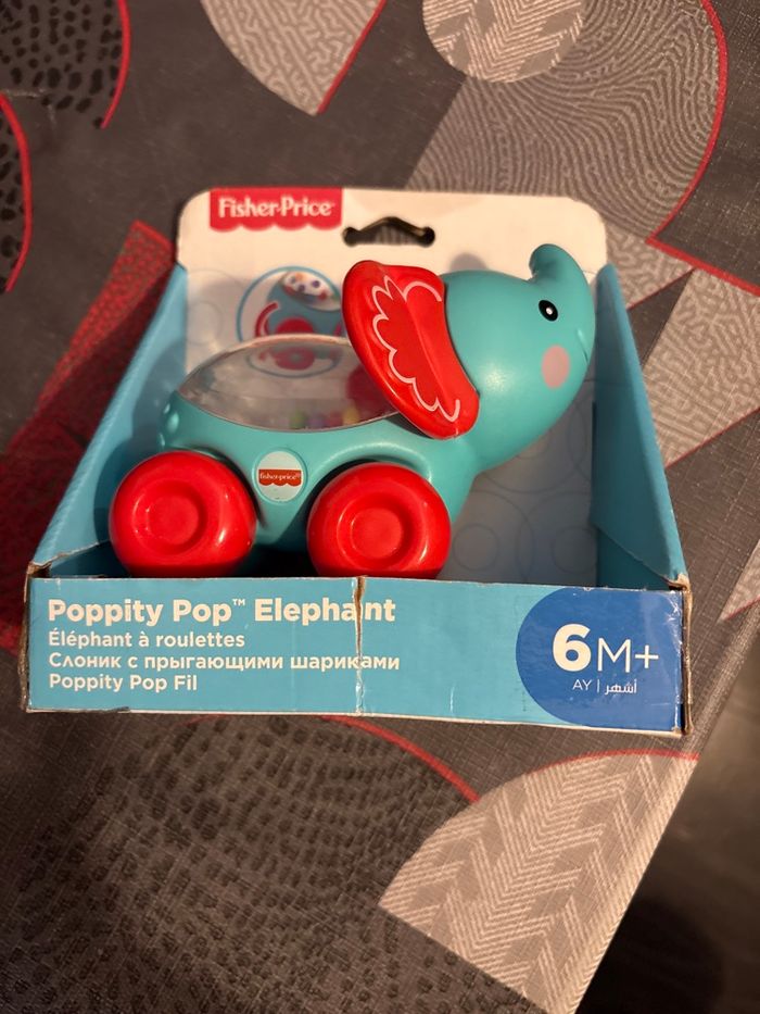 Éléphant à roulettes Fisher Price