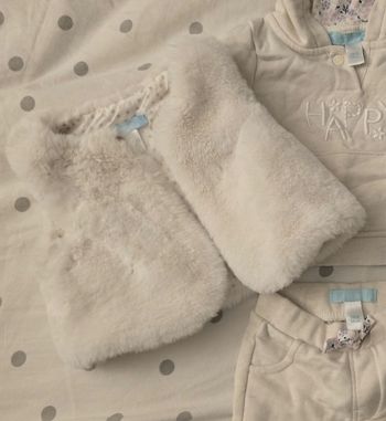Manteau fourrure sans manche