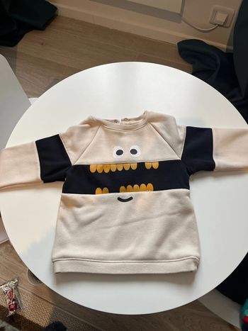 Pull crème petit monstre