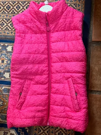 Manteau sans manche rose T.10 ans Excellent état