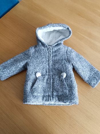 Blouson avec moumoute à l'intérieur