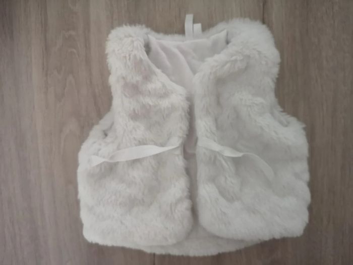 Gilet sans manche fausse fourrure