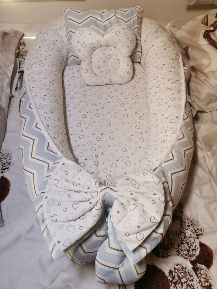 Réducteur de lit bébé