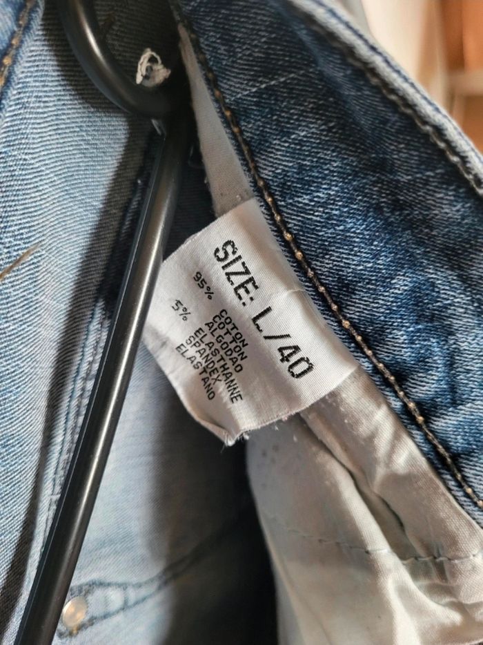 Pantalon jean bleu délavé - photo numéro 10